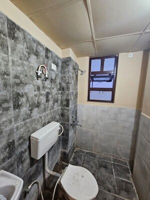 Bathroom in 1 BHK Apartment at Auric City Homes, Sector 82 – for Rent