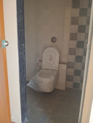 Bathroom in 3 BHK Apartment at Aaradhana Jai Matadee, Bhaskar Colony – for Rent