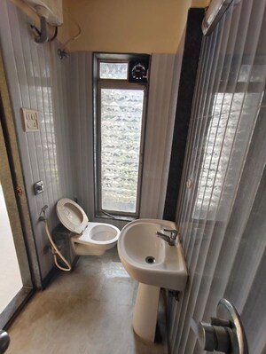 Bathroom in 1 BHK Apartment at Asha Ashok Smruti, Vadavali – for Rent