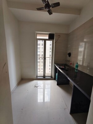 Kitchen in 1 BHK Apartment at Puranik Aarambh, Ghodbunder Road – for Rent