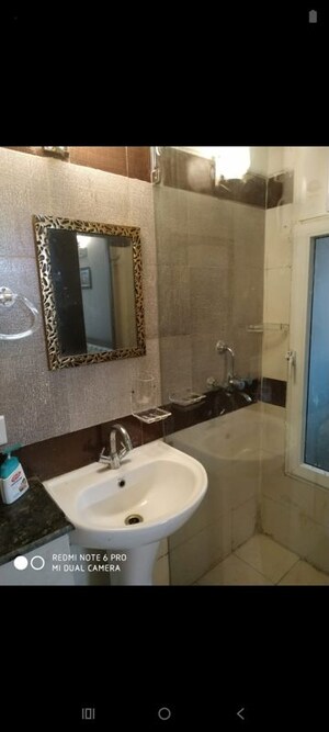 Bathroom in 3.5 BHK Apartment at Sikka Karmic Greens, Sector 78 – for Rent