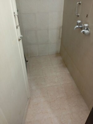 Bathroom in 1 BHK Apartment at Roop Varsha CHS, Andheri East – for Sale