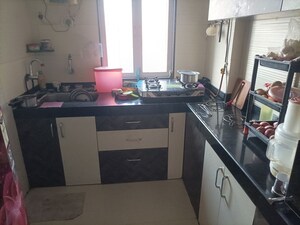 Kitchen in 1 BHK Apartment at Cosmos Classique, Ghodbunder Road – for Sale