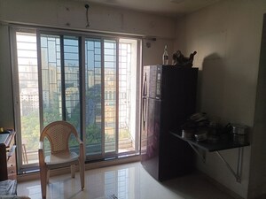 Living Room in 1 BHK Apartment at Cosmos Classique, Ghodbunder Road – for Sale