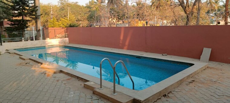 Swimming Pool, asset-placid 2 Bedroom 1100 Sq.Ft. Apartment In Chandapura Bangalore 10319555