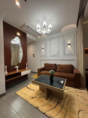 Living Room in 1 BHK Apartment at Supertech Supernova Spira Residency, Sector 94 – for Rent