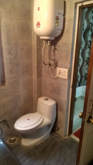 Bathroom in 3 BHK Builder Floor at Panchsheel Enclave – for Rent