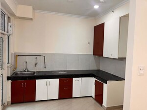 Kitchen in 3 BHK Apartment at JKG Palm Court, Sector 16c Greater Noida – for Rent