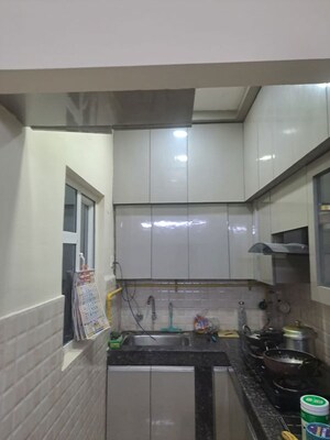 Kitchen in 2 BHK Apartment at Gaur City 2 - 14th Avenue, Sector 16c Greater Noida – for Rent