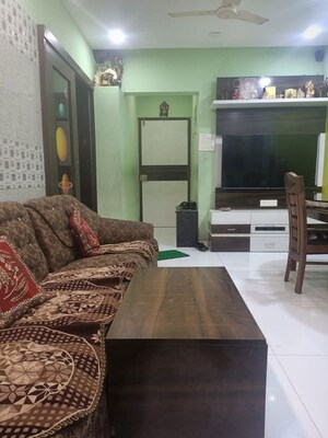 Living Room in 2.5 BHK Apartment at Radhika CHS, Kandivali East – for Rent