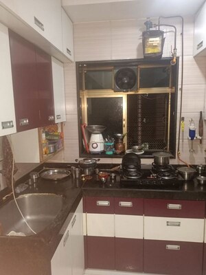 Kitchen in 2.5 BHK Apartment at Radhika CHS, Kandivali East – for Rent