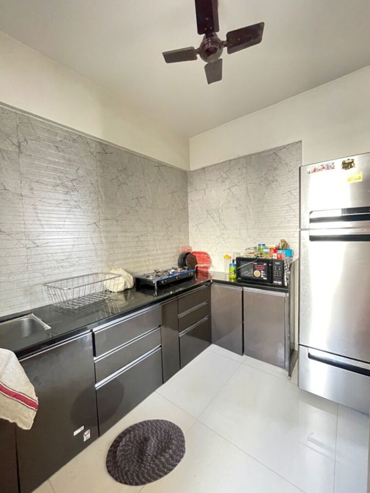 Kitchen, paranjape-forest-trails-highland-tower-9-10-and-11 2 Bedroom 710 Sq.Ft. Apartment In Bhugaon Pune 10319755