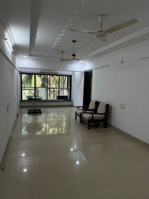 Living Room in 2 BHK Apartment at Juhu – for Rent