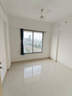 Room in 3 BHK Apartment at Romell Diva, Malad West – for Rent