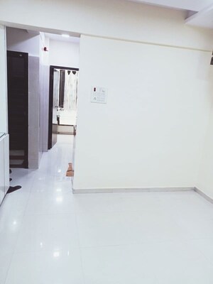 Living Room in 1 BHK Apartment at Ganga Bhaskar CHS, Kopri – for Rent