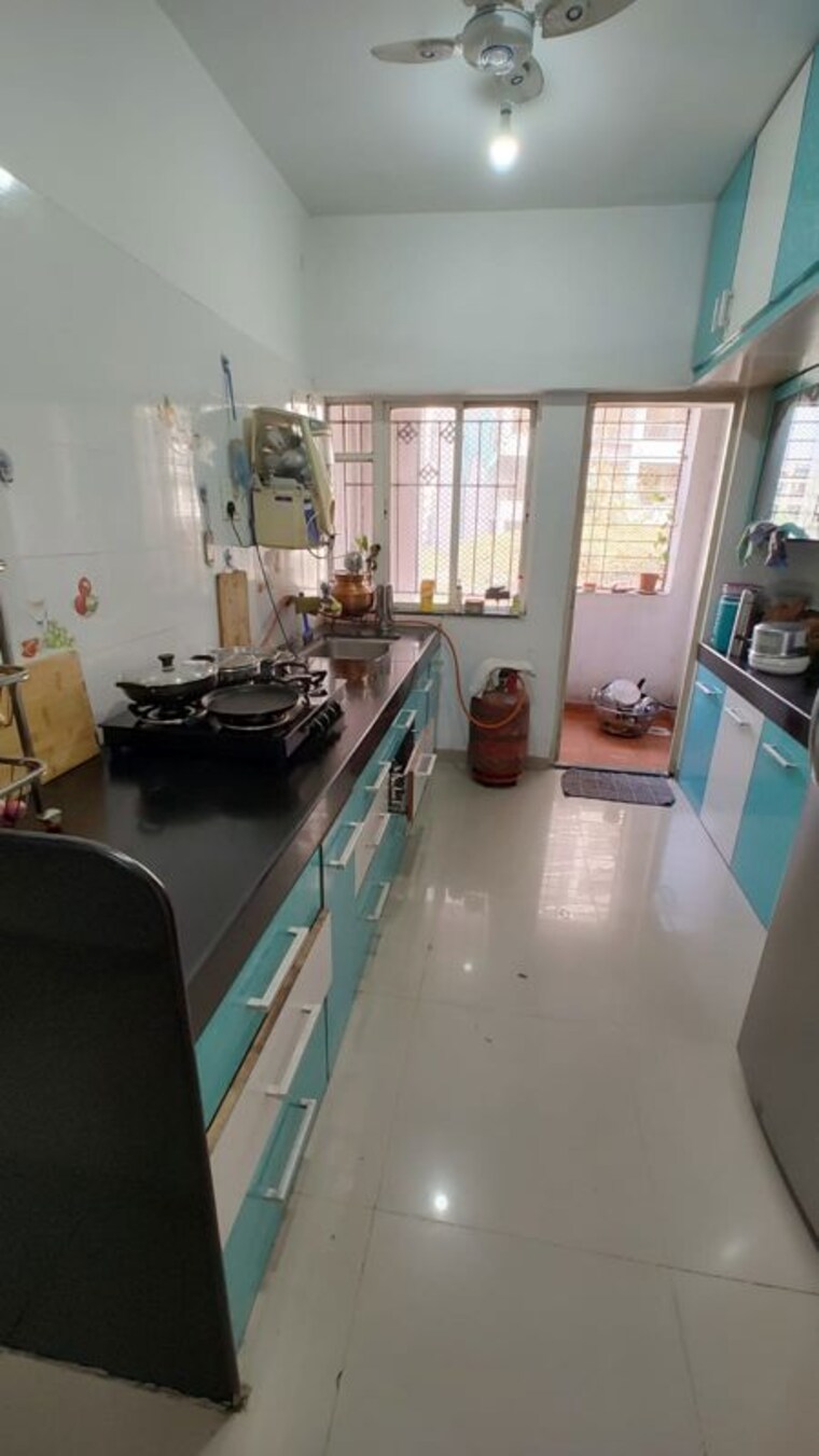 Kitchen, harit-shilp 2 Bedroom 829 Sq.Ft. Apartment In Rahatani Pune 10309590