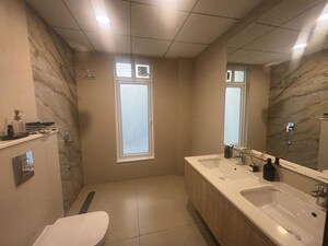 Bathroom in 4 BHK Apartment at Godrej Blue, B L Saha Road – for Sale