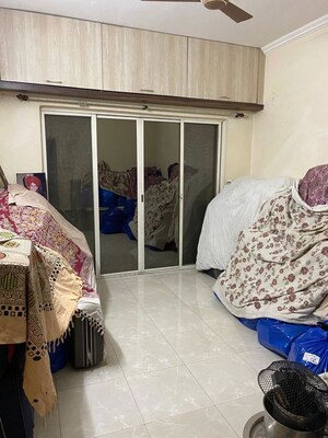 Bedroom in 2 BHK Apartment at RK Lunkad Nisarg Nirmiti, Pimple Saudagar – for Rent