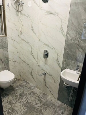 Bathroom in 1 BHK Apartment at Shraddha Panache, Tagore Nagar – for Rent