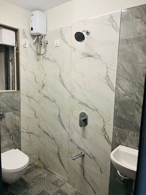 Bathroom in 1 BHK Apartment at Shraddha Panache, Tagore Nagar – for Rent