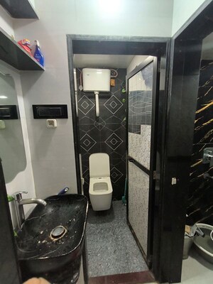 Attached Bathroom in 1 BHK Apartment at Ashtagandha Chs, Seawoods Sector 48 – for Sale