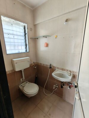 Bathroom in 2 BHK Apartment at Dheeraj Solitaire Malad, Malad West – for Rent