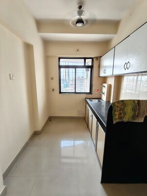 Kitchen in 2 BHK Apartment at Dheeraj Solitaire Malad, Malad West – for Rent
