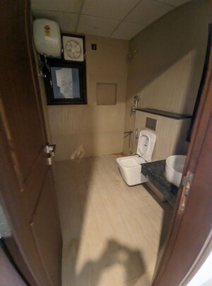 Bathroom in 4 BHK Apartment at Eros Edenwood Towers, Lakkarpur – for Sale