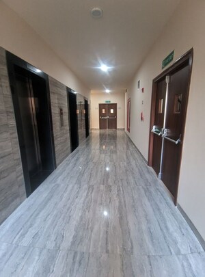 Building Lobby in 4 BHK Apartment at Eros Edenwood Towers, Lakkarpur – for Sale