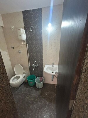 Bathroom in 2 BHK Apartment at Saakshi Parvasaakshi, Pimple Saudagar – for Rent