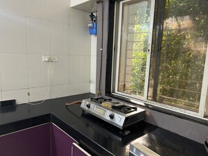 Kitchen in 2 BHK Apartment at Saakshi Parvasaakshi, Pimple Saudagar – for Rent