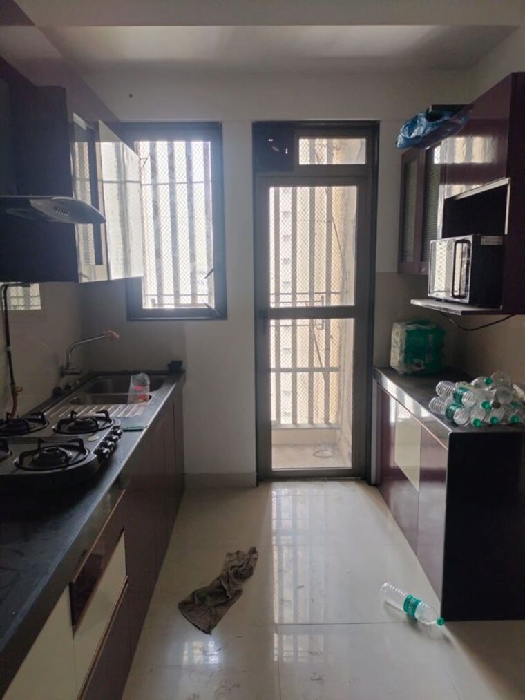 Kitchen, lodha-luxuria-westgate 2 Bedroom 737 Sq.Ft. Apartment In Majiwada Thane 10320445