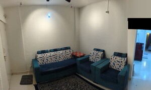 Living Room in 1 BHK Apartment at Karan Ceto, Wadgaon Sheri – for Rent