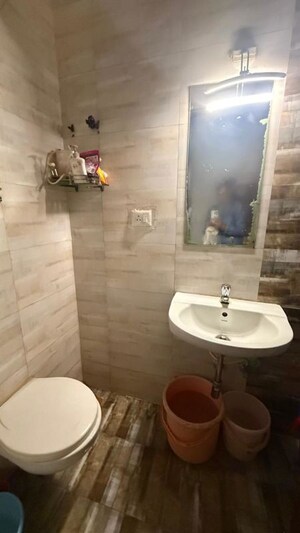 Bathroom in 2 BHK Apartment at Amey Apartments, Rambaug Colony – for Rent