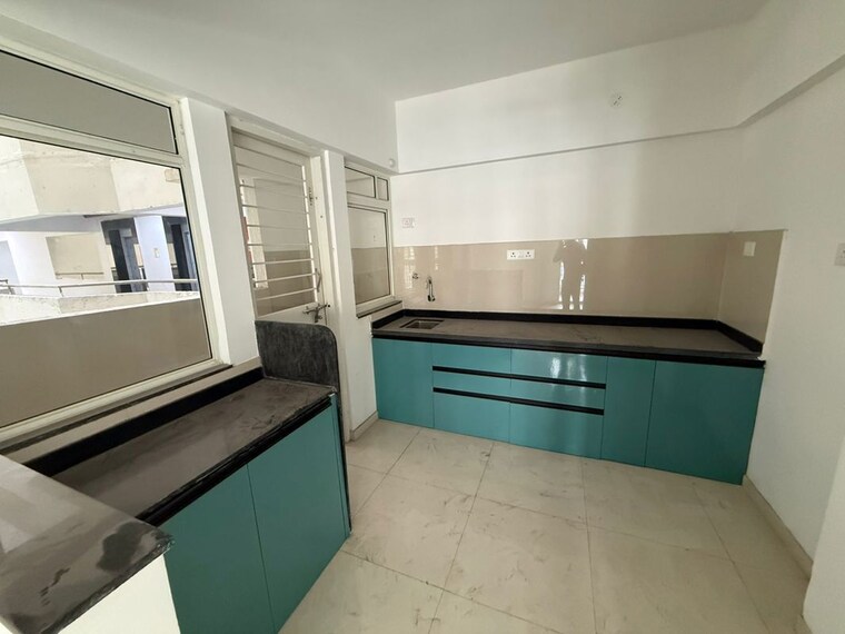 Kitchen, krisala-41-cosmo 2 Bedroom 680 Sq.Ft. Apartment In Tathawade Pune 10320597