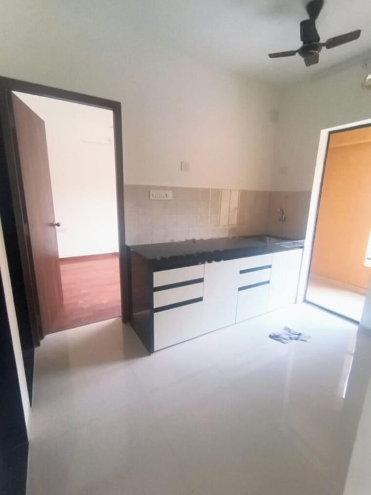 Kitchen, shapoorji-pallonji-joyville-hadapsar-annexe 2 Bedroom 944 Sq.Ft. Apartment In Hadapsar Pune 10320677