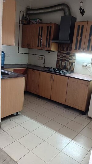 Kitchen in 4 BHK Apartment at Alok Vihar, Sector 50 – for Rent