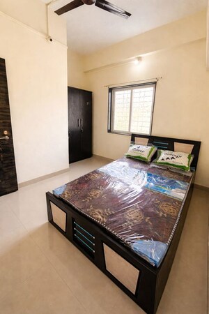 Bedroom in 1 BHK Apartment at Wadgaon Sheri – for Rent