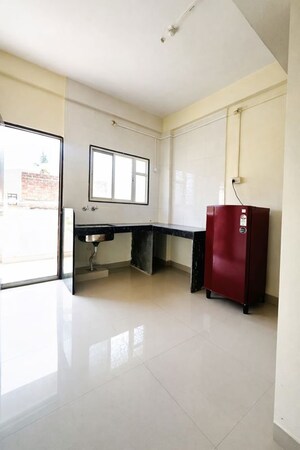 Kitchen in 1 BHK Apartment at Wadgaon Sheri – for Rent
