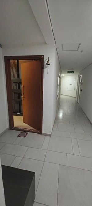 Building Lobby in 2 BHK Apartment at Bhartiya Nikoo Homes Phase 2, Thanisandra Main Road – for Rent