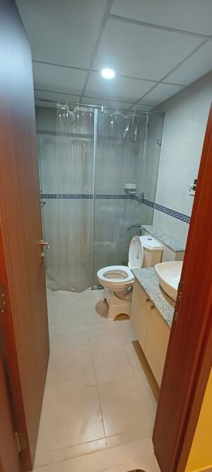 Bathroom in 2 BHK Apartment at Bhartiya Nikoo Homes Phase 2, Thanisandra Main Road – for Rent