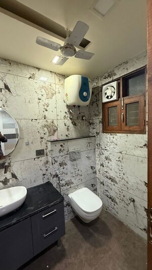 Bathroom in 4 BHK Builder Floor at Green Fields Colony – for Rent