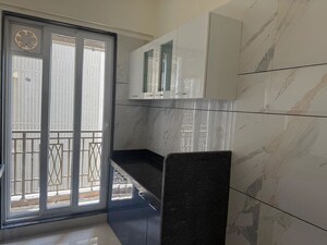 Kitchen in 3 BHK Apartment at Paradise Sai World City Phase 2, New Panvel – for Rent