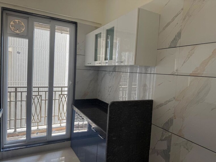 Kitchen, paradise-sai-world-city-phase-2 3 Bedroom 1724 Sq.Ft. Apartment In New Panvel Navi Mumbai 10320993