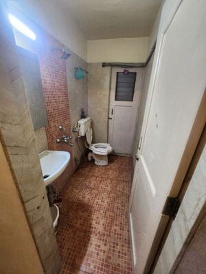 Bathroom in 3 BHK Apartment at Mahavir Square, Manpada – for Rent