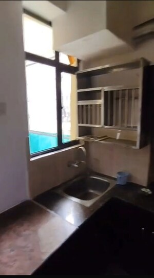 Kitchen in 2.5 BHK Apartment at Ajnara Integrity, Raj Nagar Extension – for Rent