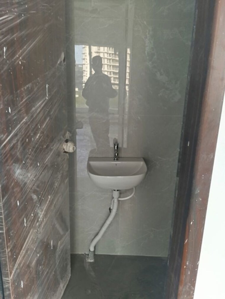 Bathroom, godrej-boulevard 2 Bedroom 750 Sq.Ft. Apartment In Manjari Pune 10321081