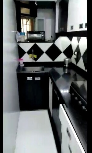 Kitchen in 2 BHK Apartment at Tulip CHS Bandra, Bandra West – for Rent