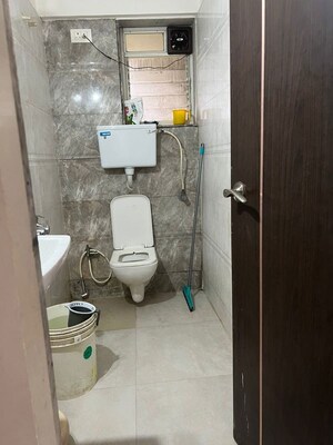 Bathroom in 1 BHK Apartment at Kavya Hill View CHS, Anand Nagar – for Sale