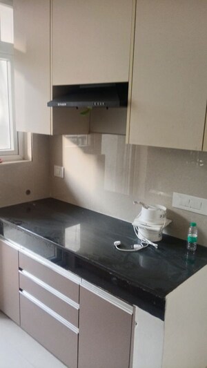 Kitchen in 2 BHK Apartment at Eldeco Live By The Greens, Sector 150 – for Rent